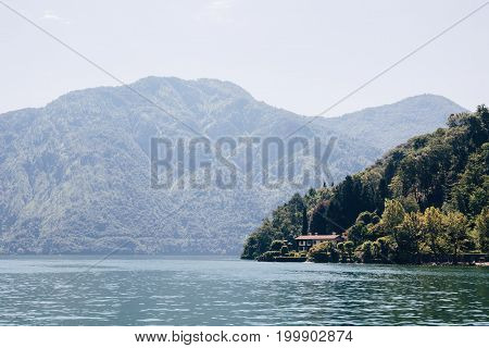 Scenic landscape over Lake Como, Italy on a bright summer day
