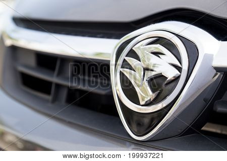 KUALA LUMPUR MALAYSIA - August 12 2017: PROTON Holdings Berhad is a Malaysia-based corporation active in automobile design manufacturing distribution and sales. Proton was established in 1983.  Picture here is the latest emblem of Proton.