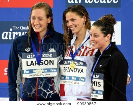 Hong Kong China - Oct 30 2016. LARSON Breeja (USA) EFIMOVA Yuliya (RUS) and HANNIS Molly (USA) at the Victory Ceremony of Women's Breaststroke 200m. FINA Swimming World Cup.