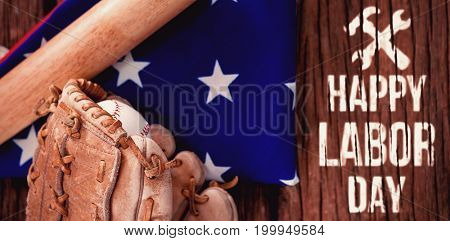 Digital composite image of happy labor day text with tools against baseball bat and gloves on american flag