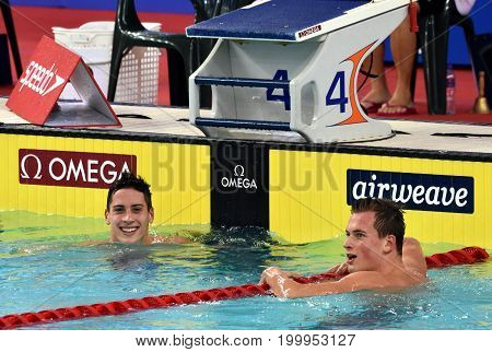 Hong Kong China - Oct 30 2016. The winner ROMANCHUK Mykhailo (UKR) and Gergely GYURTA (HUN) after the Men's Freestyle 1500m Final. FINA Swimming World Cup Victoria Park Swimming Pool.