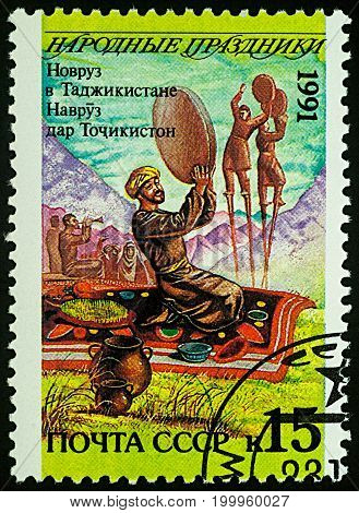 Moscow Russia - August 14 2017: A stamp printed in USSR shows Navruz holiday in Tajikistan series 