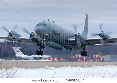 Kubinka, Moscow Region, Russia - February 19, 2014: Ilyushin Il-20M RF-93610 reconnaissance airplane takes off at Kubinka air force base.