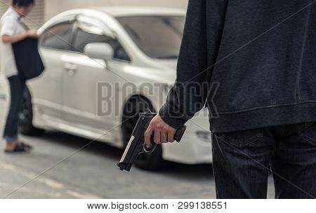 Woman Being Purse Rob By Man Wearing Striped Shirt, Black Mask, Holding Gun. Car Paking Lot. Crimina