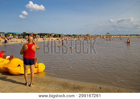 Unknown People Bathe In The Salt Lake