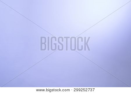 Single-color background on which there is a light glare, gradient