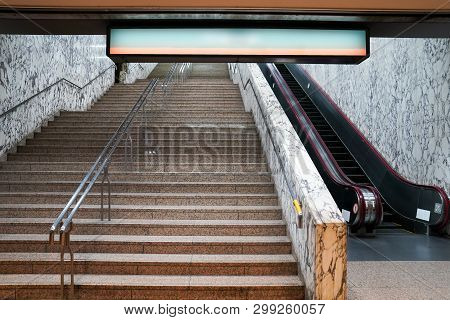 Underground Gateway, Entrance And Exit With Large Stairway And Escalator Beside. Lightingbox Green A