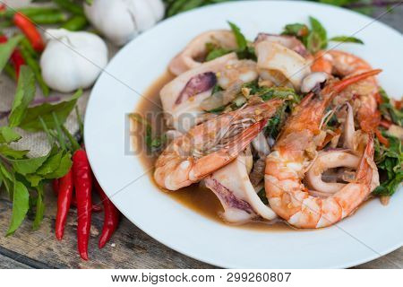 Thai Food; Stir Fired Seafood With Basil. Thai Famaous Traditional And Original Spicy Dish