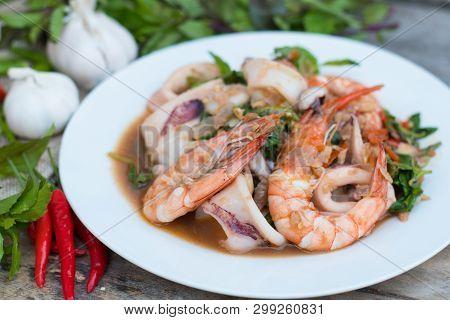 Thai Food; Stir Fired Seafood With Basil. Thai Famaous Traditional And Original Spicy Dish