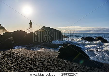 View Of The Atlantic Ocean From The Coast Of Iceland. The Reynisfjara Beach