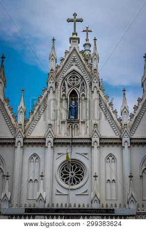 Our Lady Of Dourdes Church Top View With Blue Sky Which Is At Thirssur.