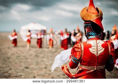 Photo Of Young Beautiful Women Wearing In Traditional National Mongolian Kalmykian Dresses In The Fe