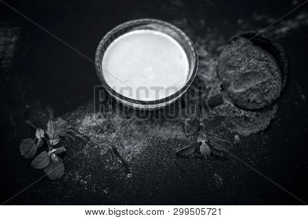 Ayurvedic Herb Brahmi Or Waterhyssop With Its Beneficial Paste Ina  Glass Bowl Along With Its Powder