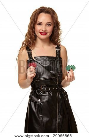 Casino Concept. Portrait Of Young Pretty Caucasian Woman, Playing In Casino. Roulette, Poker Chips, 