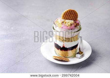 Healhy Diet Dessert In Glass Jar Tasty Dessert With Yogurt Diet Jam And Almond Cookies In Jars Fitne