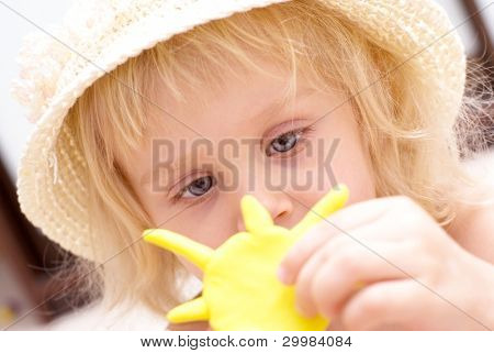 	A child playing with playing sun