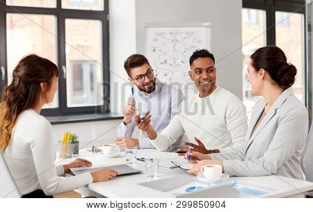 new job, hiring and employment concept - international team of recruiters having interview with asian female employee at office