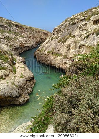 Wied Il-ghasri Lagoon Narrow Bay On Gozo Malta With Crystal Blue Turquoise Water