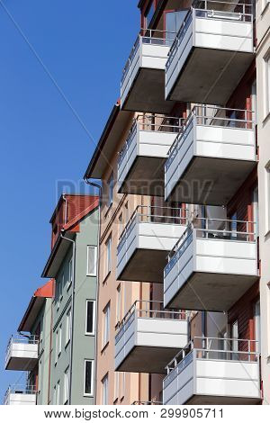 Close-up Of A Modern Multi-story Apartment Residential Building With Balconies.