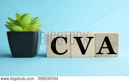 Cva. Letters On Wooden Cubes On A Blue Background