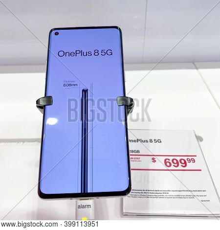 Orlando, Fl Usa -  November 13, 2020:  The Latest Oneplus  Cellphone On Display At T Mobile.