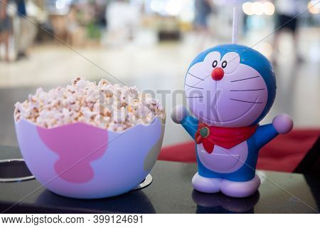 Bangkok, Thailand - December 12, 2020 : Cute Toy Of Doraemon Set Of Bucket Popcorn And Soft Drink To