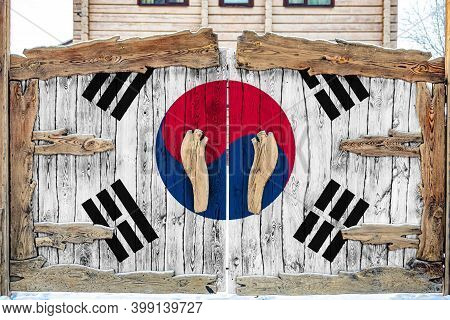 Close-up Of The National Flag Of South Korea On A Wooden Gate At The Entrance To The Closed Territor