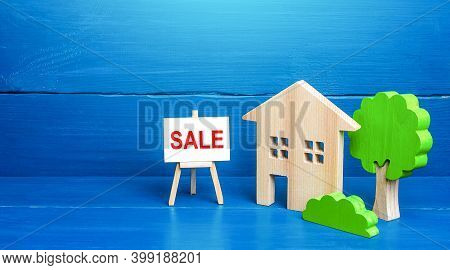 Residential Building Figurine And Easel Sale Sign. Home Purchase Proposal, Mortgage Loan. Lending Pr