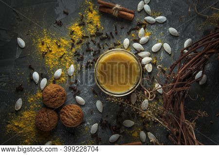 A Jar Of Honey, Pumpkin Seeds, Cookies, Cinnamon Sticks And A Wreath Of Dry Twigs And Herbs. Composi