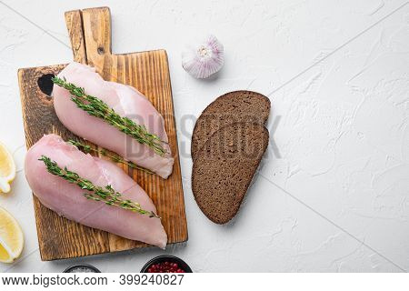 Crispy Garlicky Chicken Raw Ingredients On White Background, Top View With Copy Space