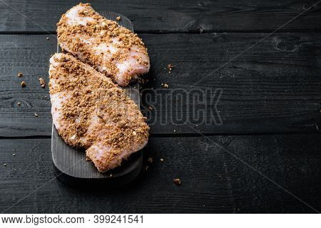 Crispy Garlicky Chicken Raw Ingredients, On Black Wooden Background With Copy Space