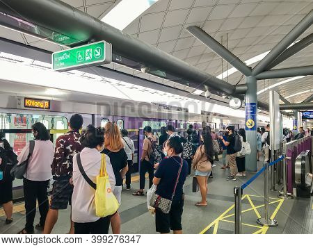 Bangkok, Thailand - December 04 2020: Peoples At Bangkok Skytrain (bts) Or The Metropolitan Rapid Tr