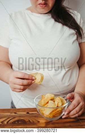 Compulsive Overeating, Mindless Snacking, Junk Food, Unhealthy Meals. Woman Eating Chips From Bowl, 