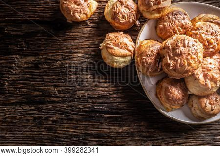 Top View Of Crispy Hot Bread Buns Called Pogaca On A Rustic Wood.