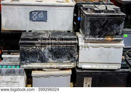 A Pallet With Used Car Batteries Awaiting Recycling