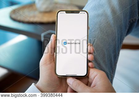 Alanya, Turkey - December 6, 2020: Man Hand Holding Iphone 12 Pro Max Gold With Social Networking Se