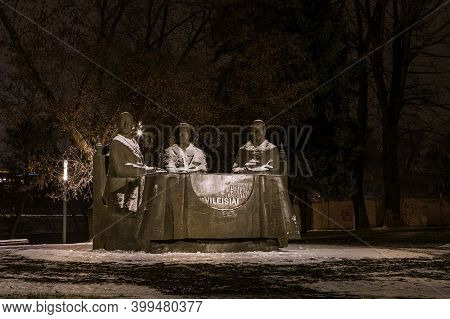 Vilnius, Lithuania - December 13, 2020: Night View Of The Monument To The Brothers Vileisis, Social 