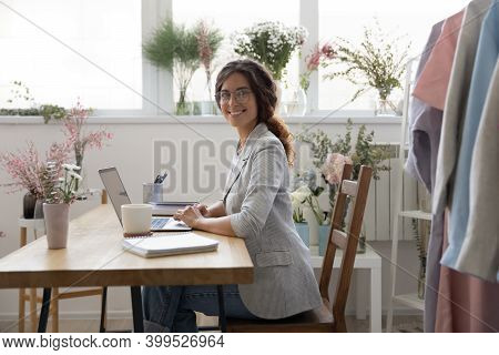 Portrait Of Happy Self Employed Businesswoman Successful At Creative Profession