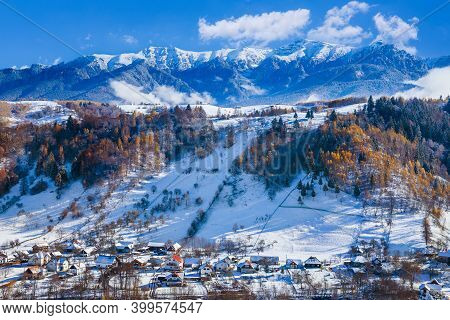 Winter In Moeciu Village. Rural Landscape In The Carpathians, Romania.