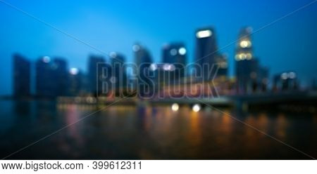 Twilight Sunset Of City And Building Blurred Background.