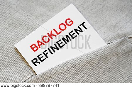 Backlog Refinement Text On The White Sticker In The Shirt Pocket.