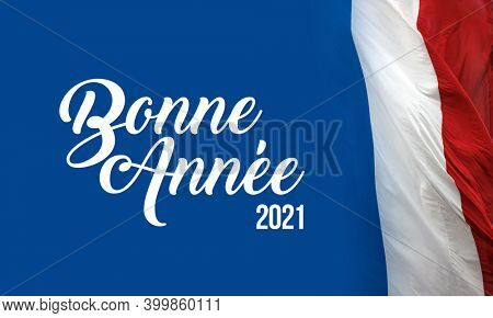 Sign with the French flag and the  words Bonne annee translating Happy New Year 2021 in French