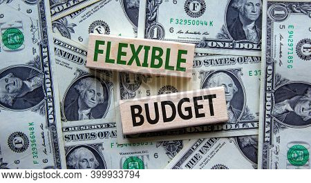 Flexible Budget Symbol. Wooden Blocks With Words 'flexible Budget'. Beautiful Background From Dollar