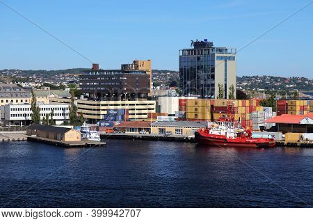 Kristiansand, Norway - July 31, 2020: Ships And Shipping Containers In Kristiansand Harbor, Norway. 