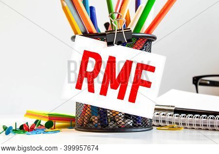 Businessman Hand With Pen Pointing To Rmf Sign On The Paper