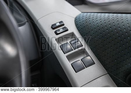 Novosibirsk, Russia - December 17, 2020:  Toyota Vitz, Close Up Of A Door Control Panel In A New Mod