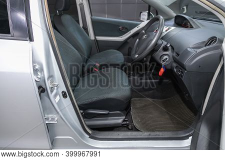 Novosibirsk, Russia - December 17, 2020:  Toyota Vitz, Dark Car Interior - Steering Wheel, Shift Lev