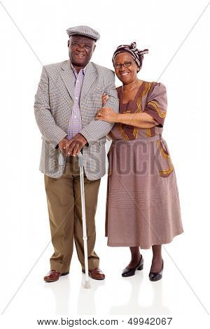 smiling elderly africam couple standing on white background