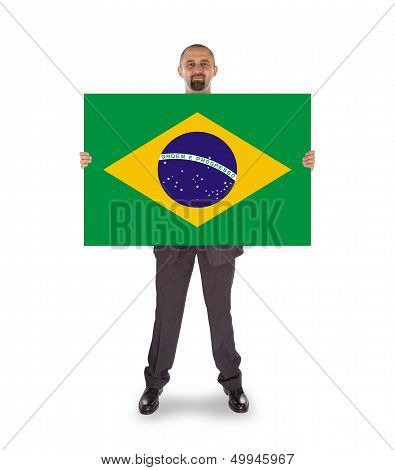 Smiling Businessman Holding A Big Card, Flag Of Brazil