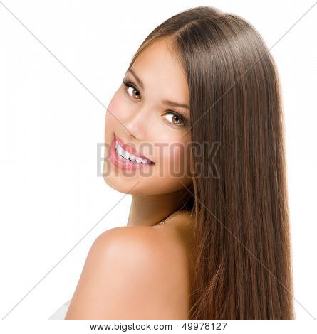 Beauty Girl Face. Beautiful Teenage Model Girl Portrait. Clean Fresh Skin and Long Hair. Brown Eyes and Hair. Looking at Camera 